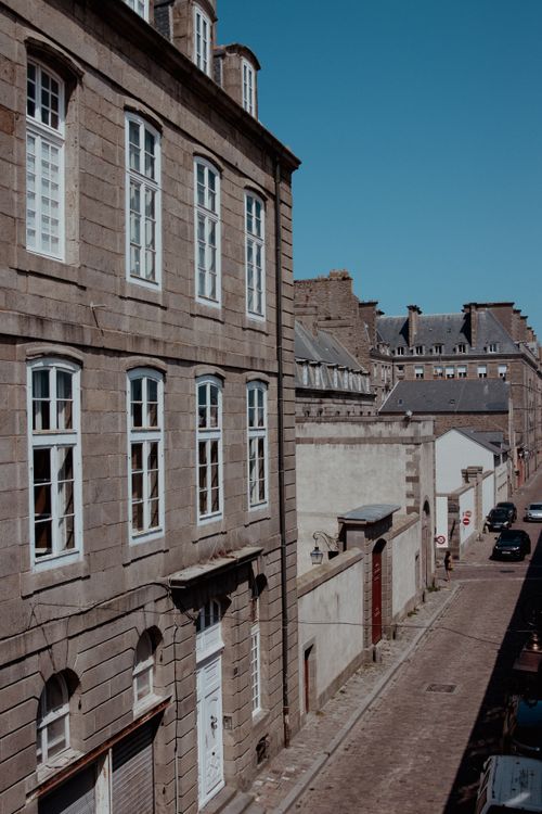 Free Cobblestone street in historic Saint-Malo, France, featuring classic architecture. Stock Photo