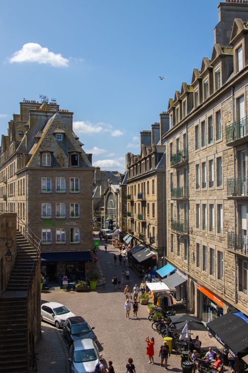 Free Bustling street scene in Saint-Malo, Brittany, France showcasing historical architecture and lively atmosphere. Stock Photo