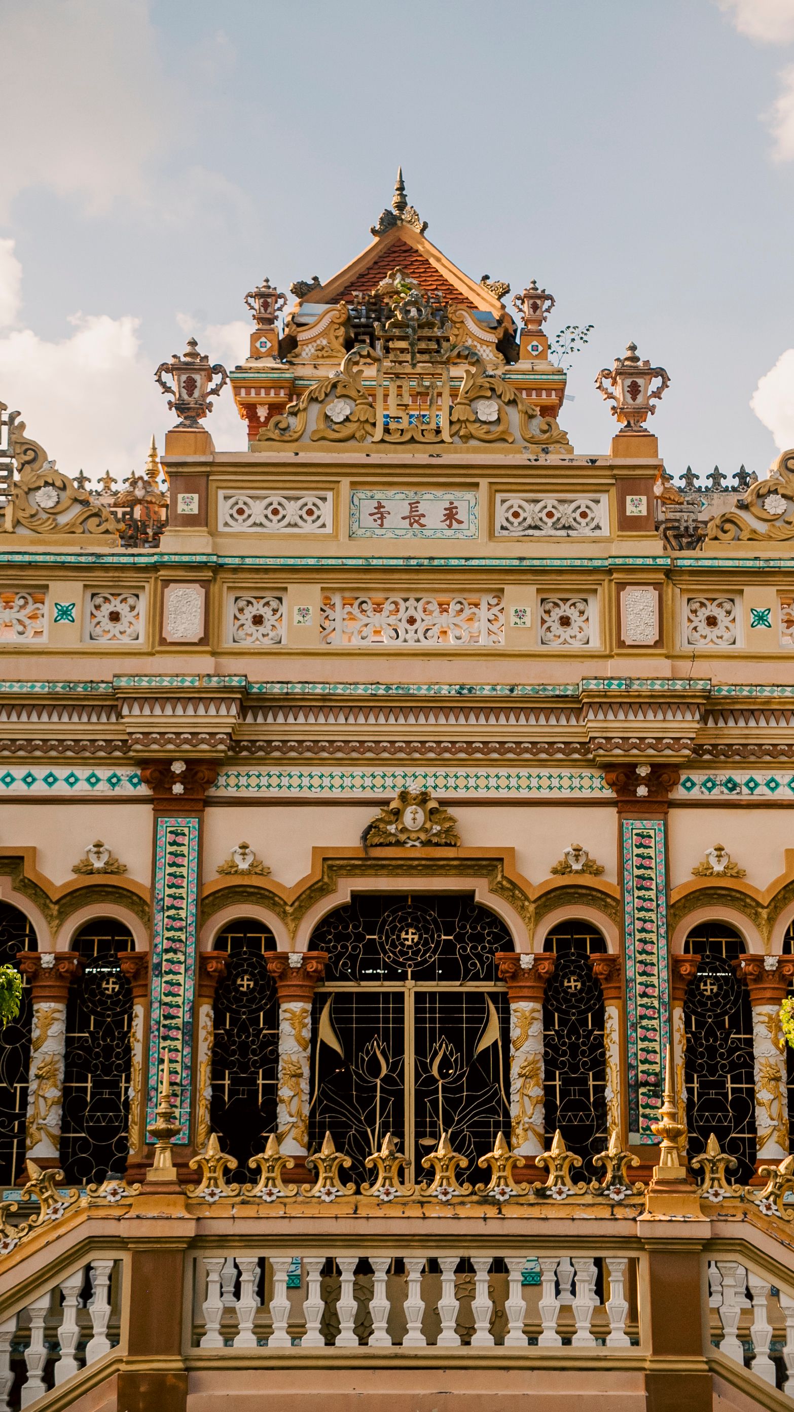 Detailed view of Huong Tich Pagoda's ornate facade in Dong Thap, Vietnam.