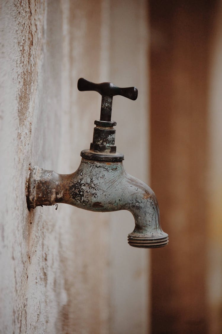 Shabby Vintage Faucet In Old Bathroom