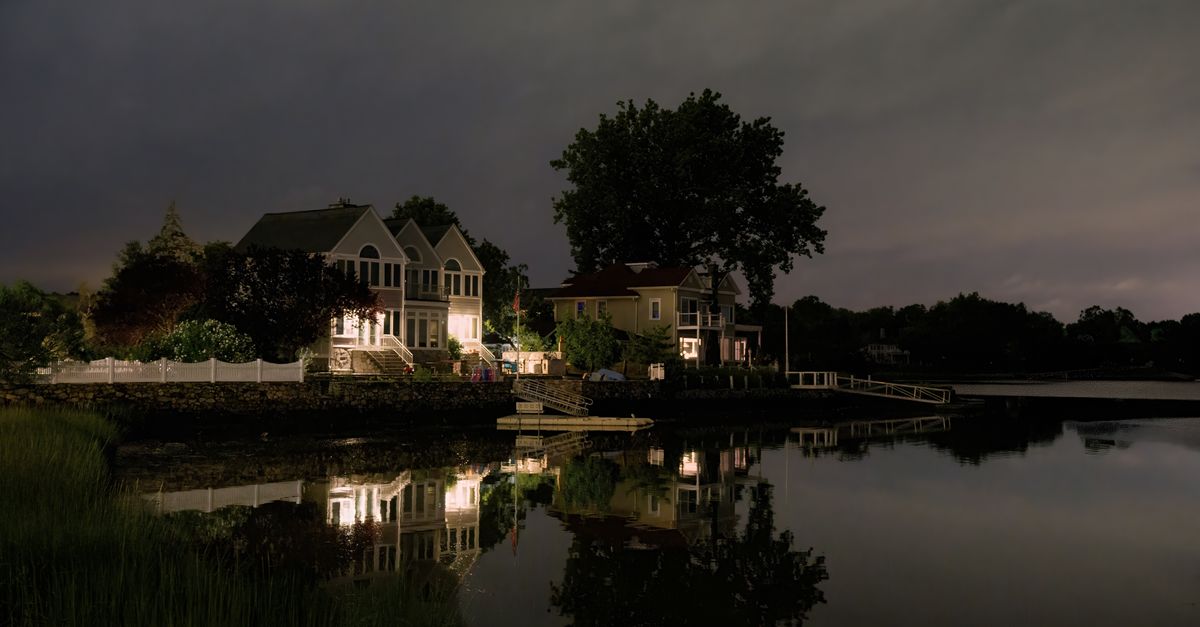 A serene view of waterfront homes at twilight in Stamford, Connecticut.