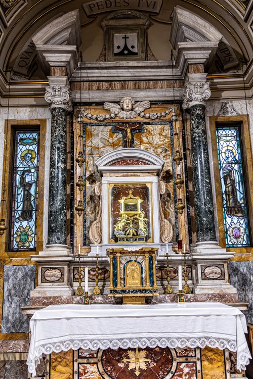 Free Elaborate church altar with stained glass windows, showcasing religious artistry. Stock Photo