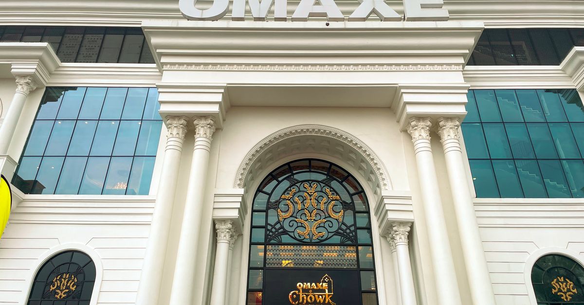 Grand entrance of Omaxe Chowk with classical architecture in New Delhi, India.