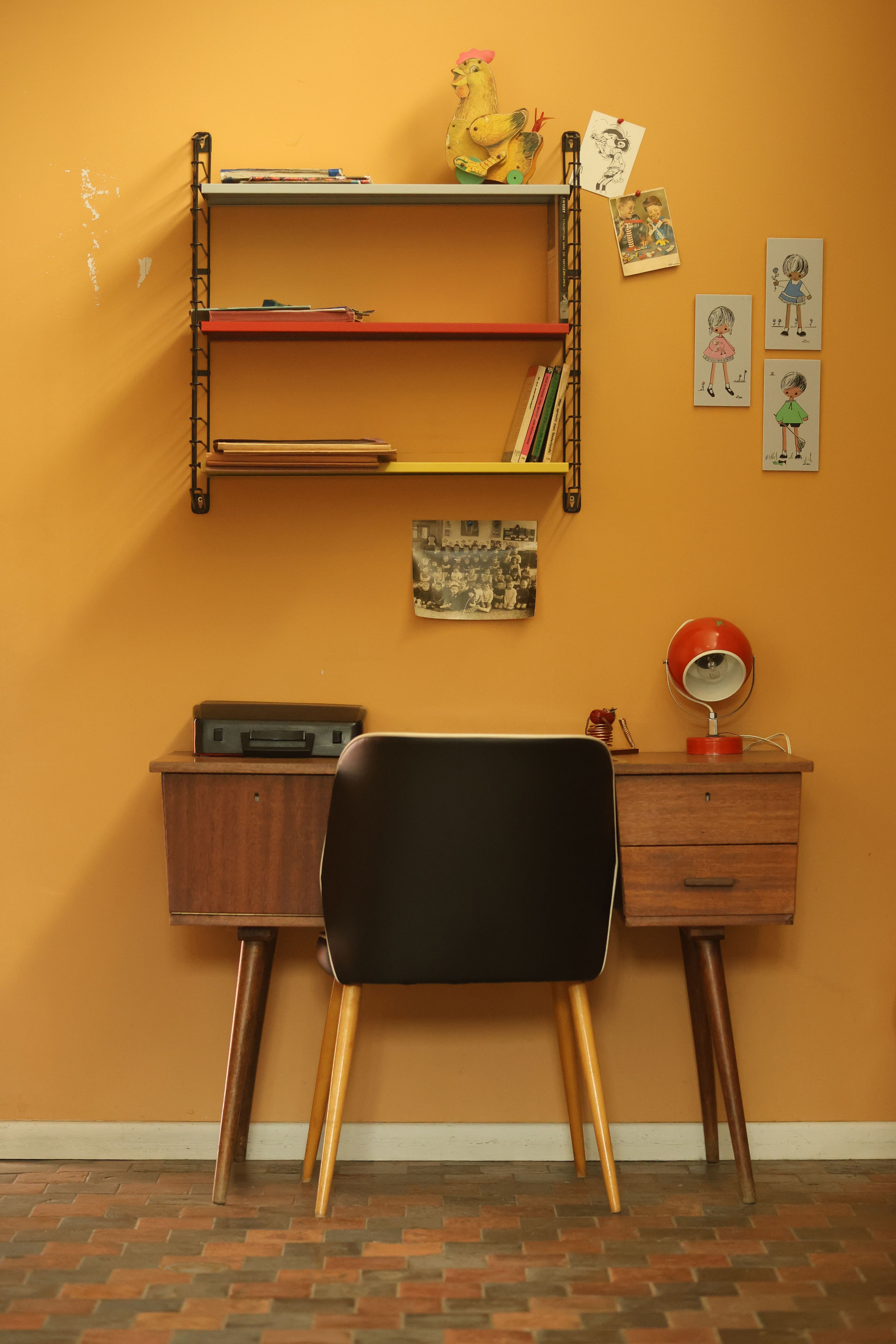 Cozy vintage retro-styled workspace with mid-century furniture
