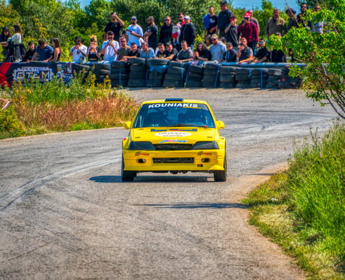 Free Action-packed car rally race with spectators in Ritsona, Greece. Stock Photo