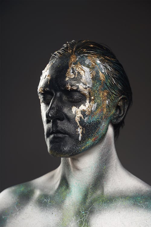 Man Covered In Paint