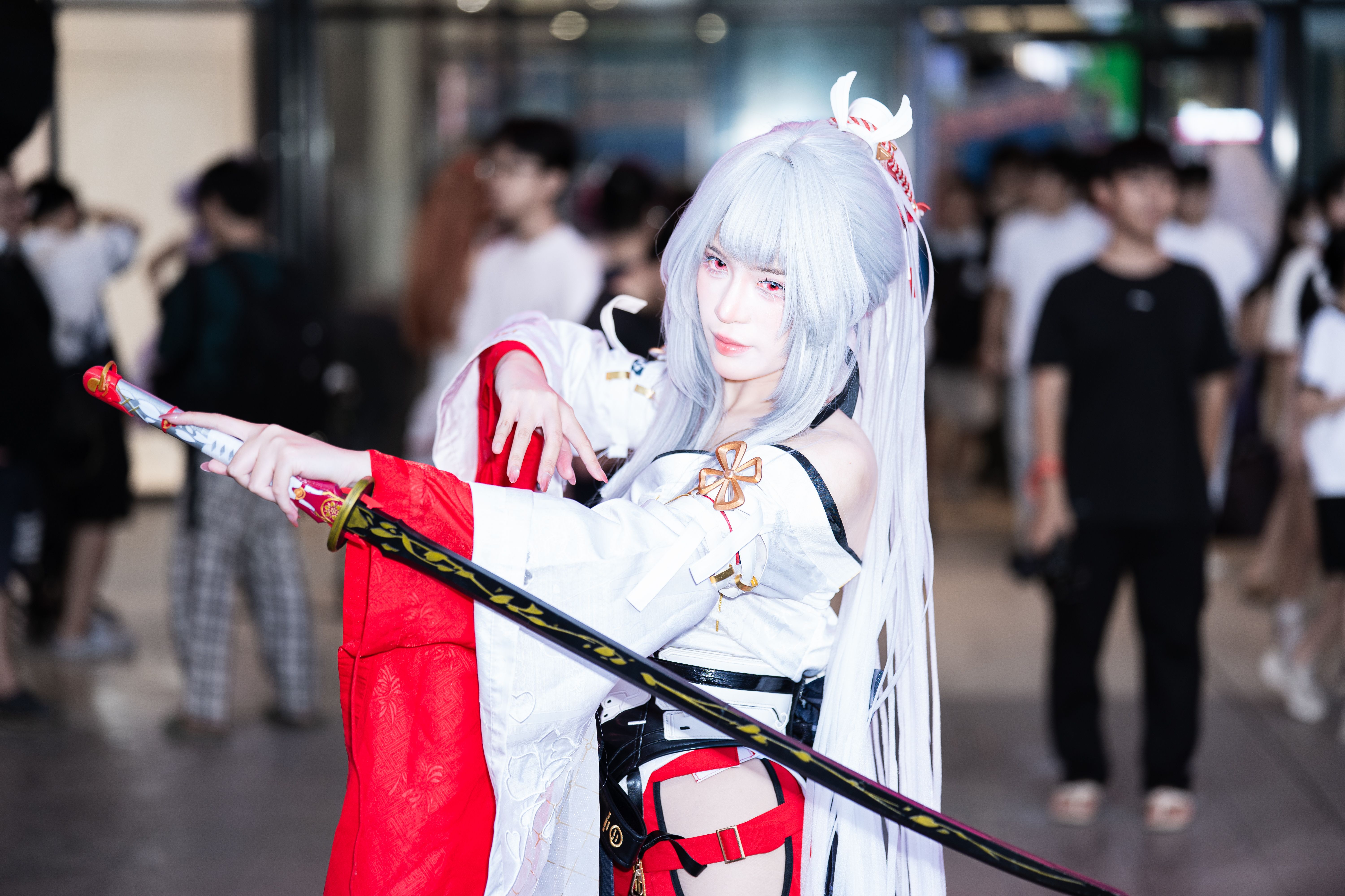 Cosplayer Posing with Katana at Anime Convention