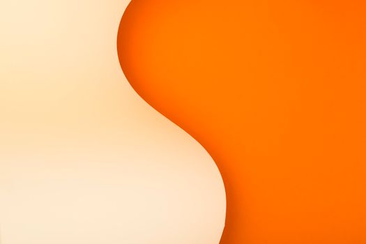 Minimalist abstract design featuring curved orange and cream shapes.