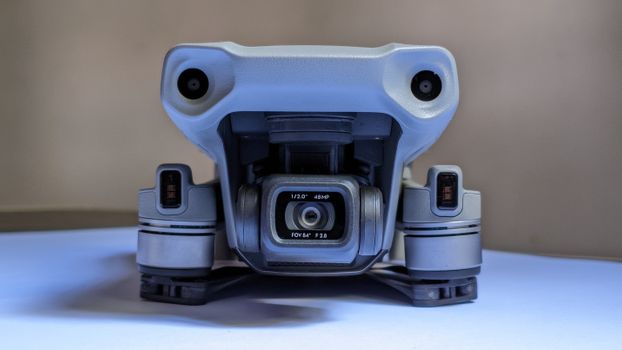 Detailed front view of a high-resolution drone camera with advanced lens features.