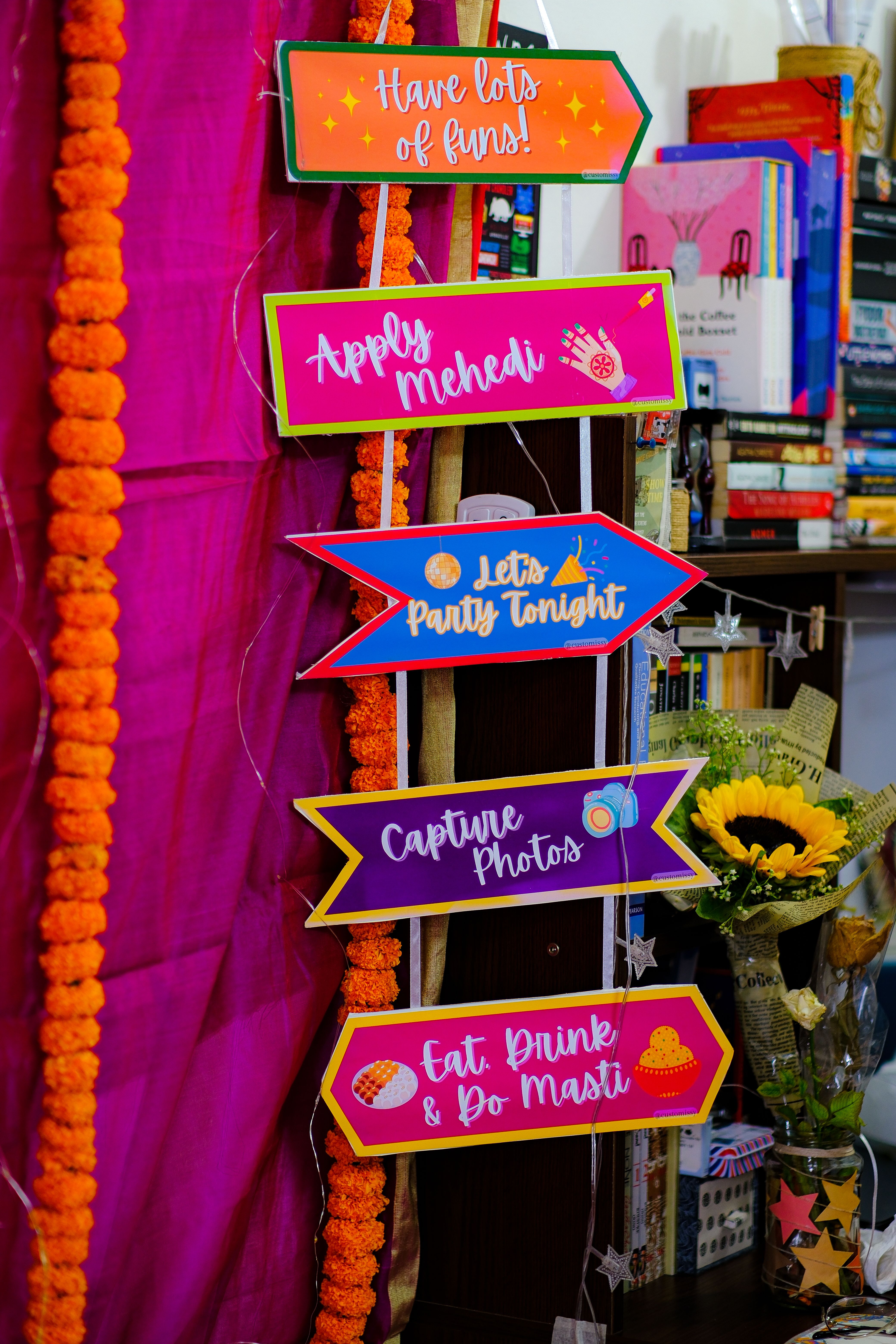 Vibrant photo of decorative party signs with festive themes.