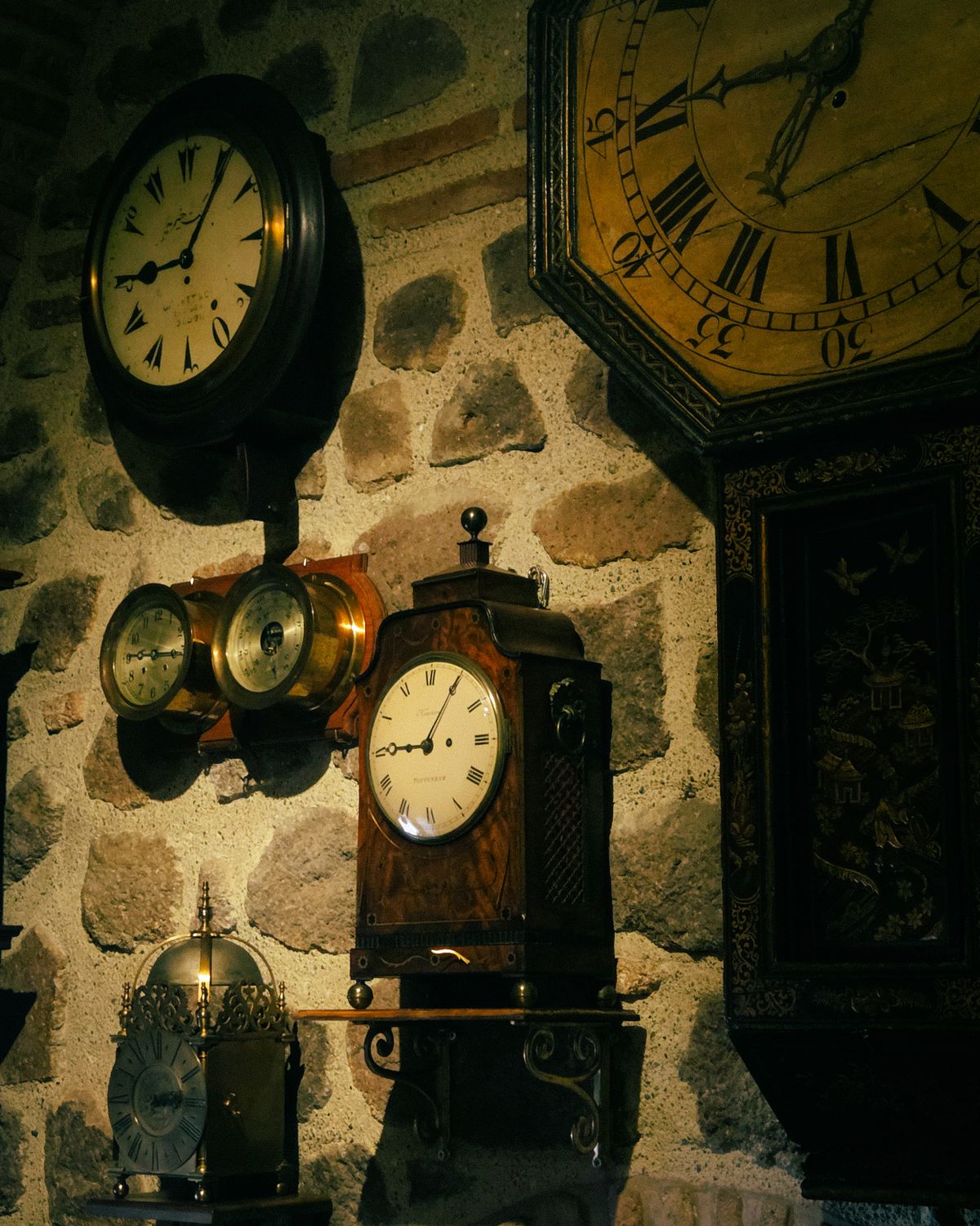 Vintage wall clocks on display