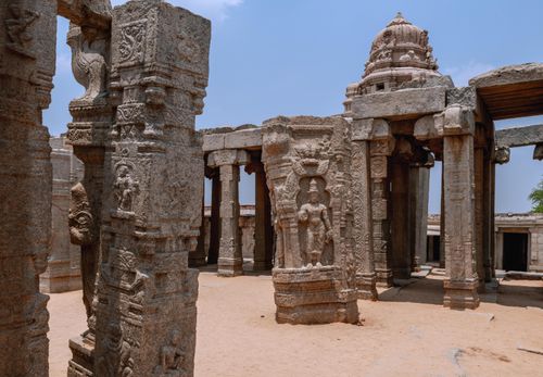 Free Intricately carved stone pillars at the historic Lepakshi Temple in Andhra Pradesh, India. Stock Photo