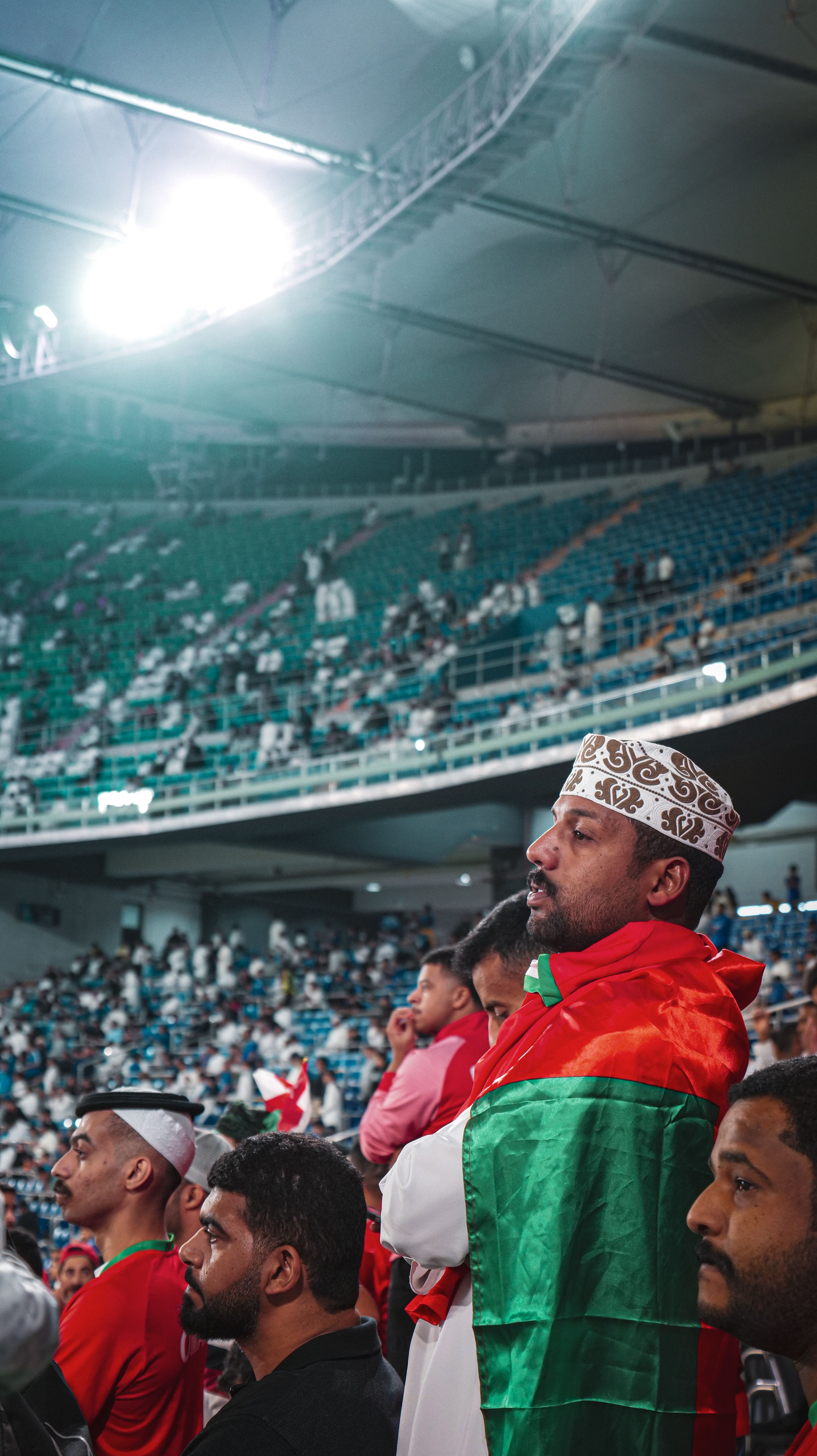 Excited Fans in Colorful Stadium Atmosphere