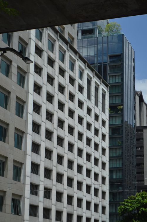 Free A modern cityscape capturing geometric architecture of high-rise buildings. Stock Photo
