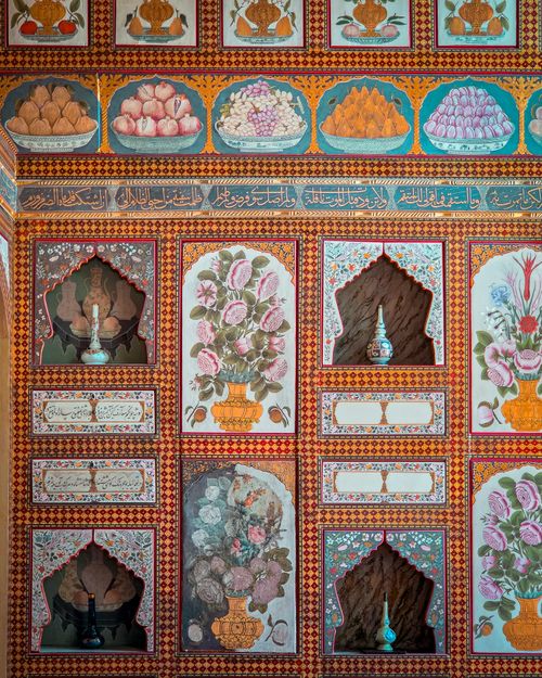 Free Ornate wall decorations with floral art and Arabic calligraphy in an Istanbul palace. Stock Photo