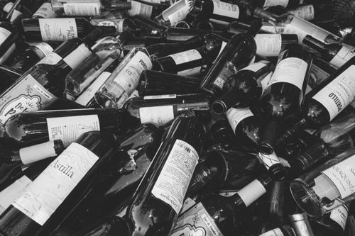 Free A dramatic black and white image of a pile of wine bottles in Mendoza, Argentina. Stock Photo