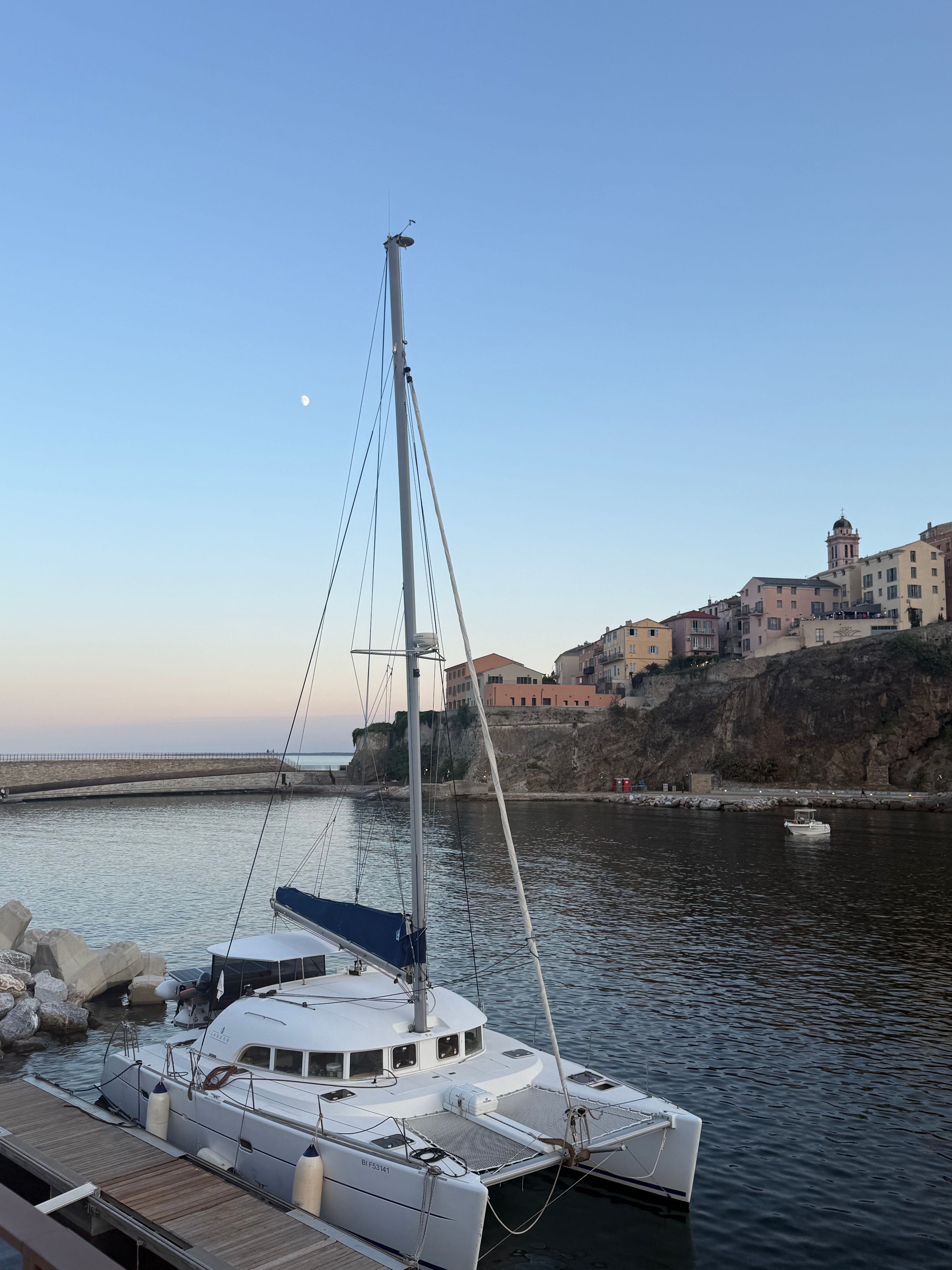 Sailboat Moored in Bastia Harbor at Twilight