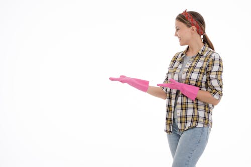 Free A Woman Wearing Pink Latex Gloves Stock Photo