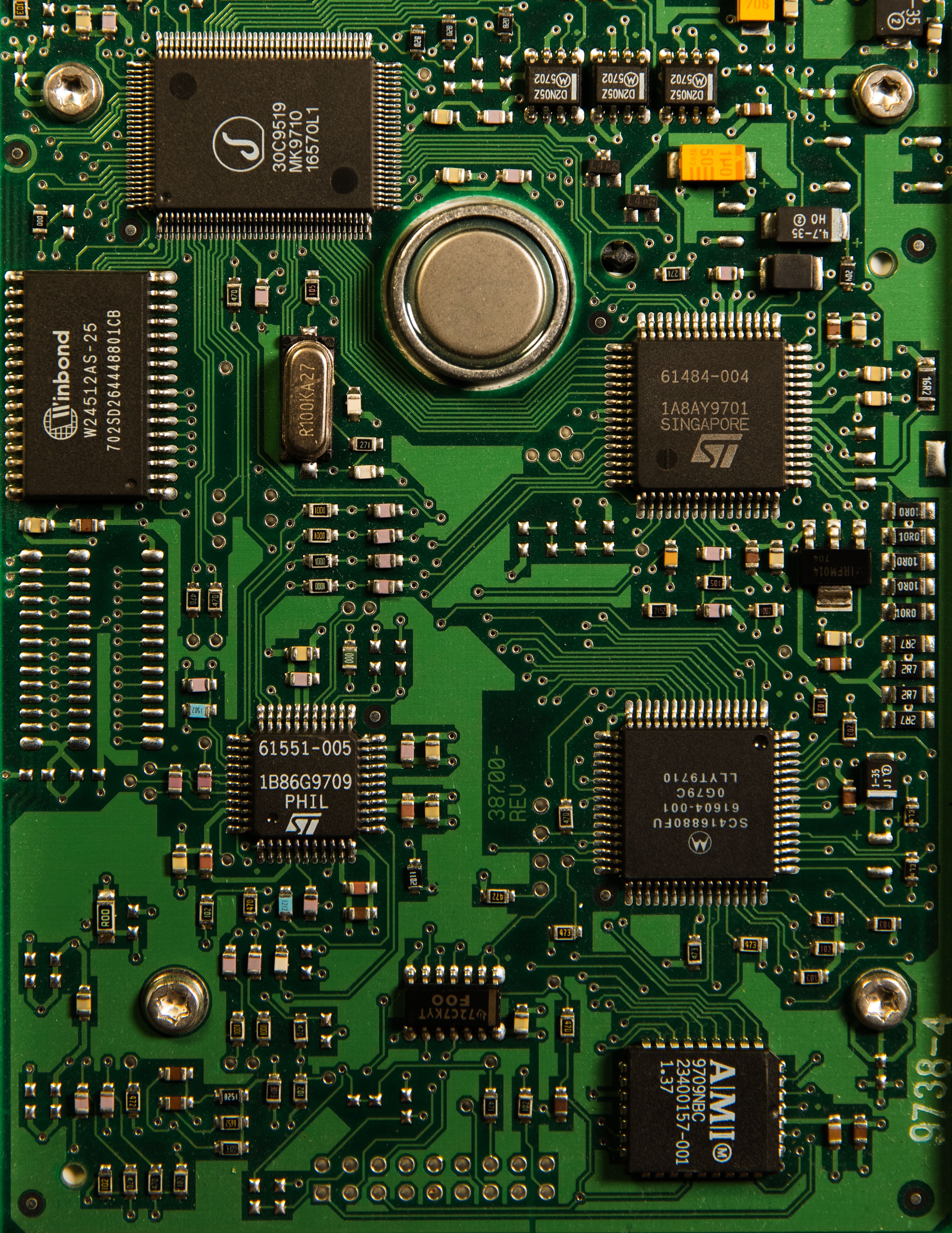 Close-up of circuit-board traces, chips and surface-mount components