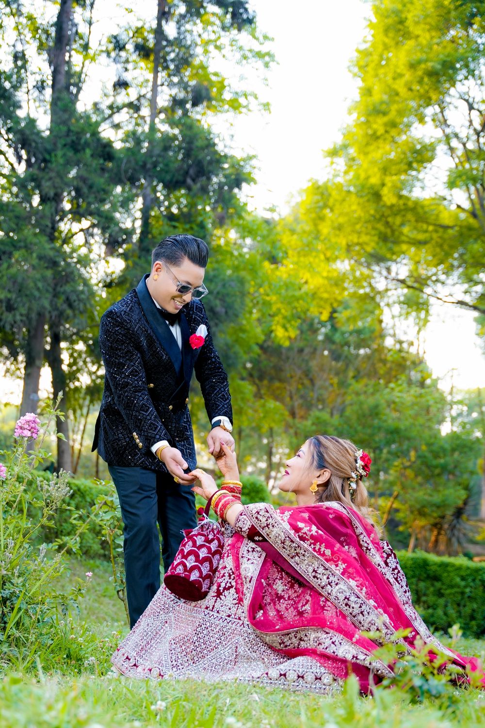 Wedding couple portrait in a lush garden