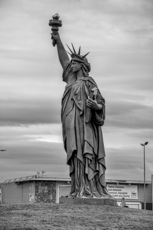 Free Black and white image of a Statue of Liberty replica in Colmar, France. Stock Photo