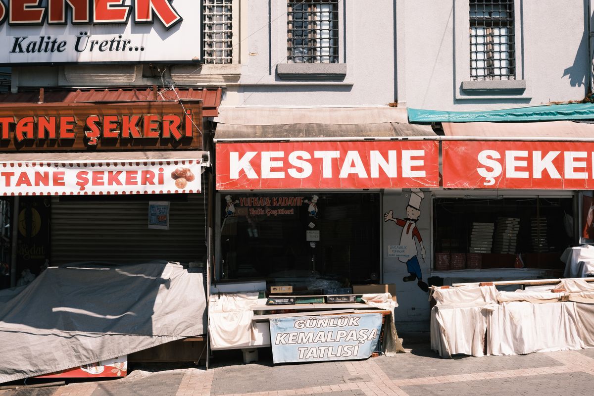 Exterior of a Turkish sweet shop selling chestnut candies and daily sweets.