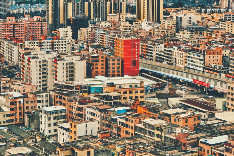 Aerial view of the densely packed buildings in Dongguan, China showcasing the urban density and architecture.