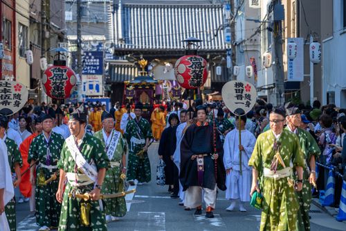 Free Colorful Japanese festival parade showcasing traditional attire and cultural elements. Stock Photo