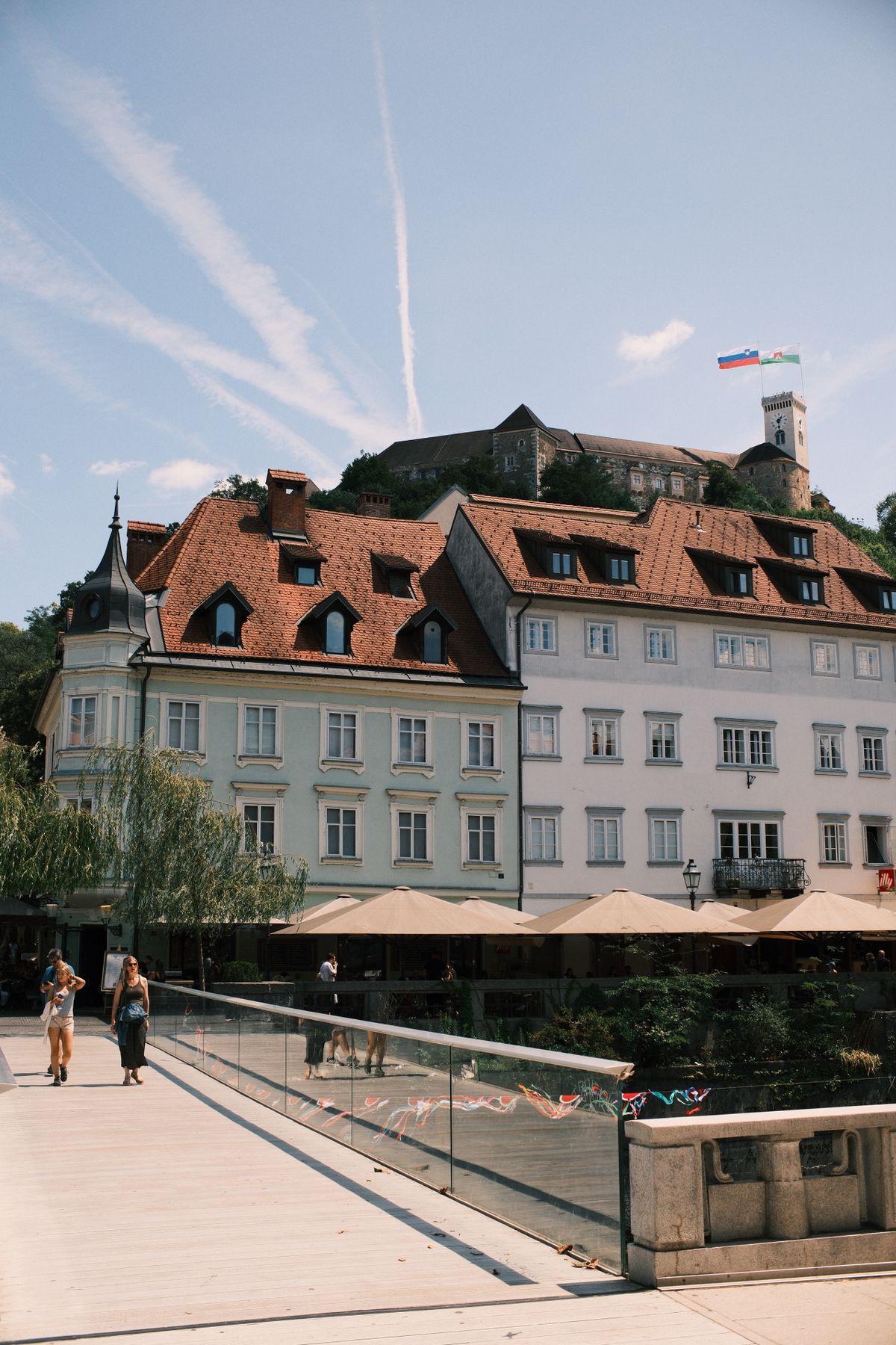 A Ljubljana street with the castle visible on the hill above