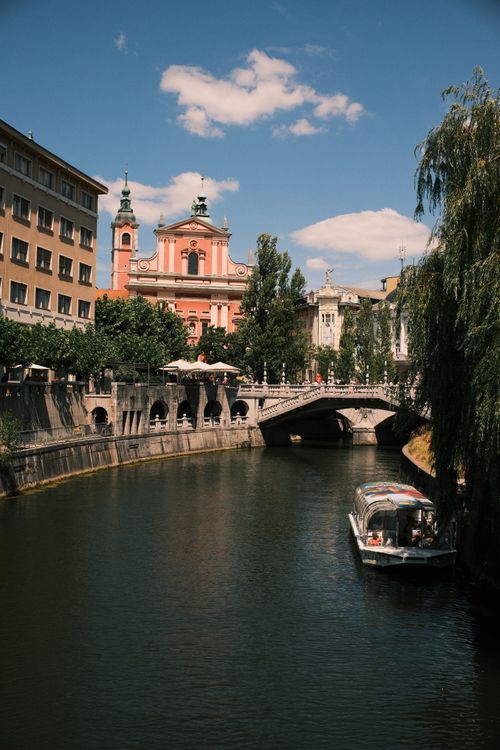 Free View of Prešeren Square and Tromostovje Bridge over the Ljubljanica River in Ljubljana, Slovenia. Stock Photo