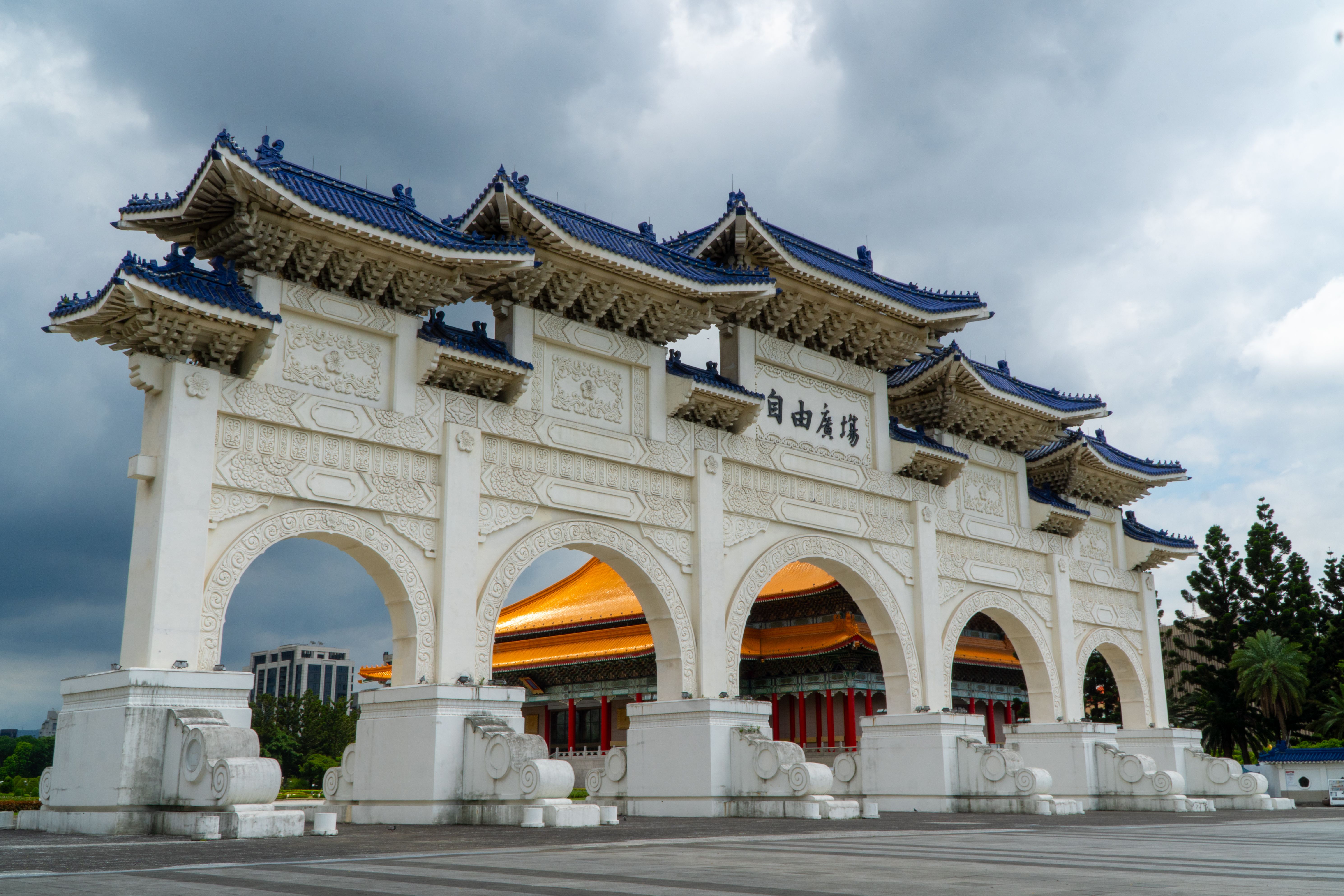 Grand entrance gate of the Chiang Kai-shek Memorial Hall in Taipei, showcasing traditional architecture.