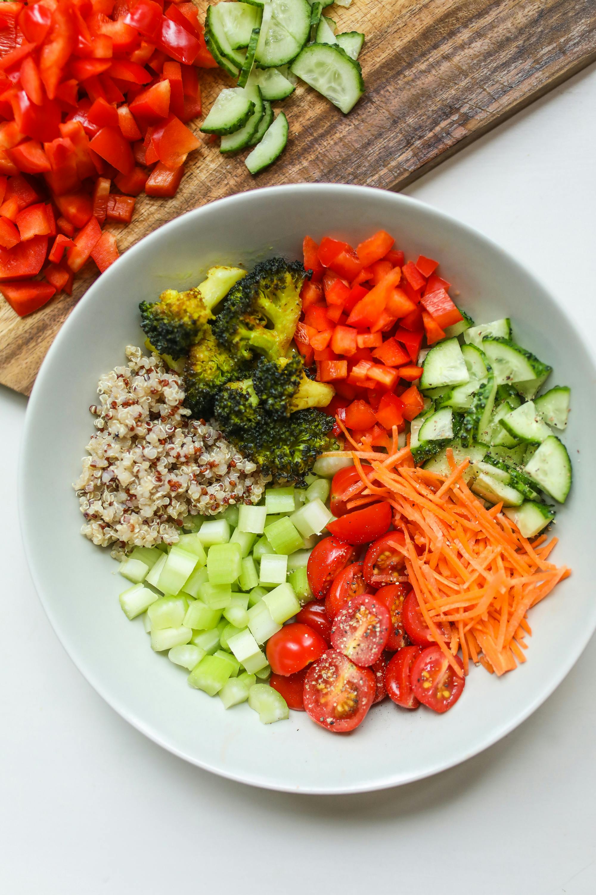 Free Photo Of Bowl Beside Wooden Chopping Board Stock Photo