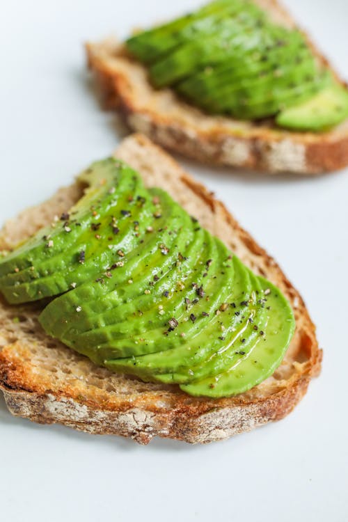 Free Close-Up Photo Of Sliced Bread With Avocado Stock Photo