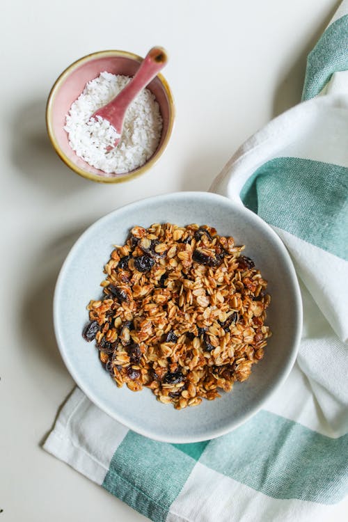 Photo Of Granola On A Ceramic Bowl