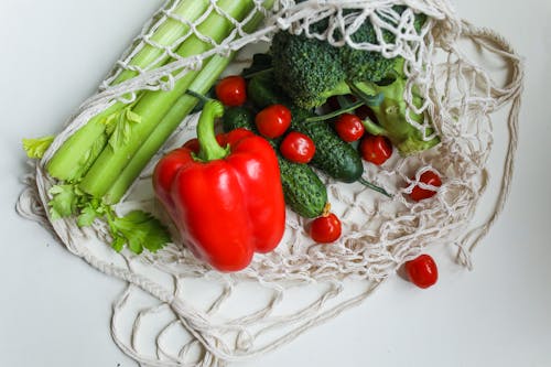 Photo Of Red Pepper Beside Pickles