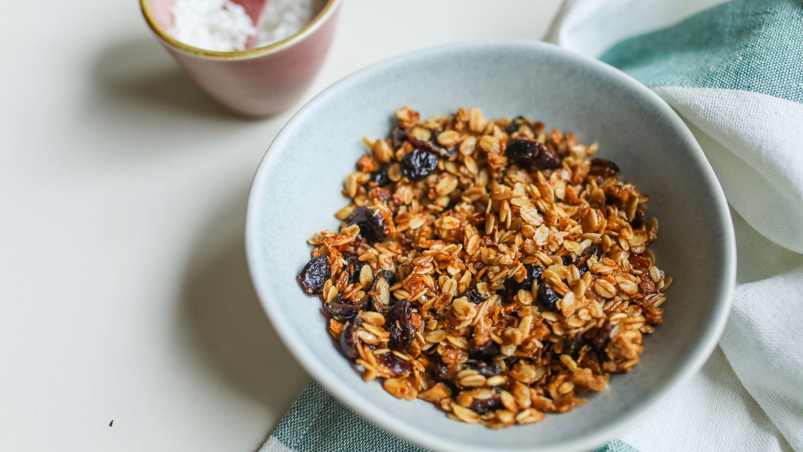 A bowl of homemade granola with raisins — photo by Polina Tankilevitch on Pexels A bowl of homemade granola with raisins