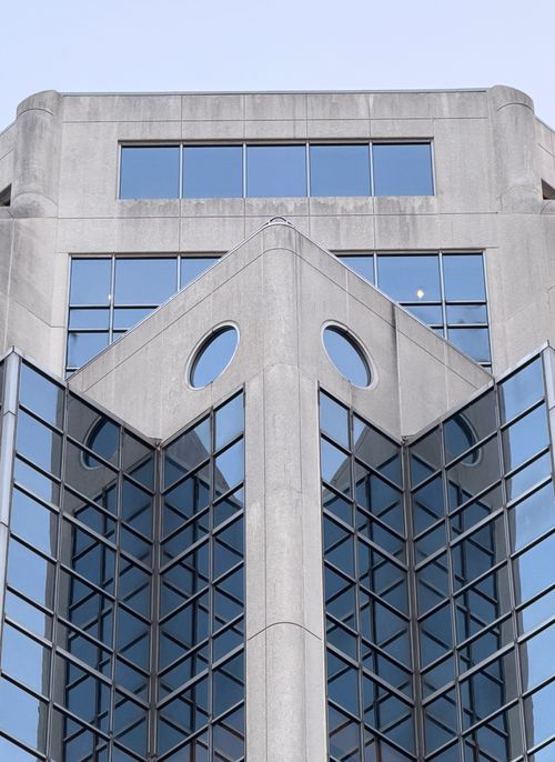 Free Close-up view of a modern building facade in Halifax, showcasing geometric design and reflections. Stock Photo