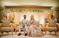 Photo Of Woman Sitting Beside Man