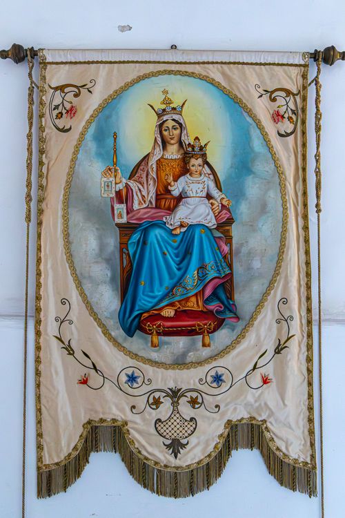 Free Ornate religious tapestry depicting biblical scenes with detailed craftsmanship and vibrant colors. Stock Photo