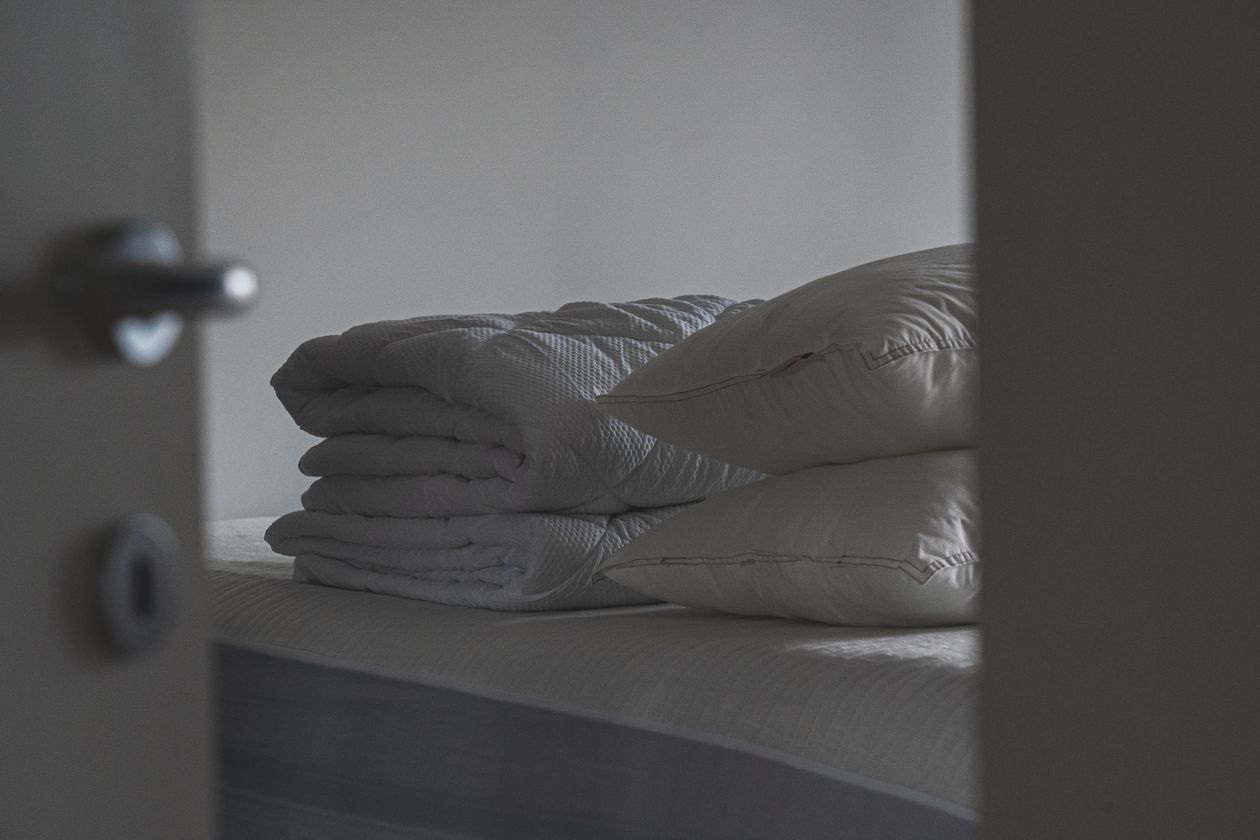 Calm small bedroom after a quick evening wind-down routine.