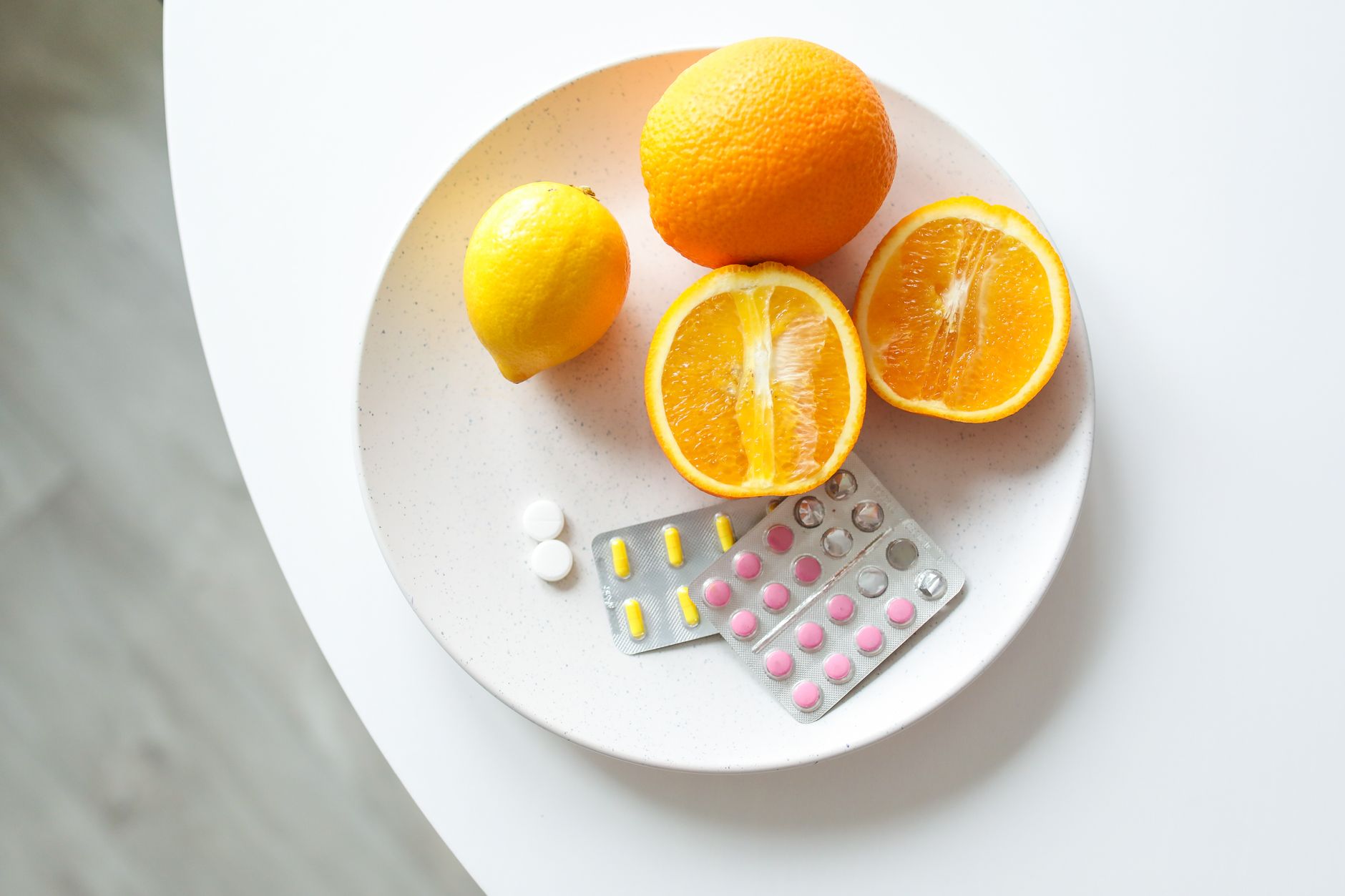 Fresh immune-boosting vegetables and fruits on a wooden board