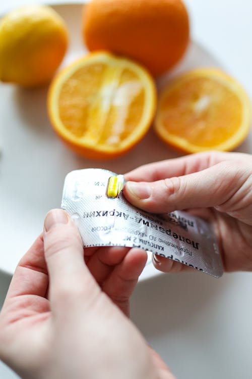 Photo Of Person Holding Medicine