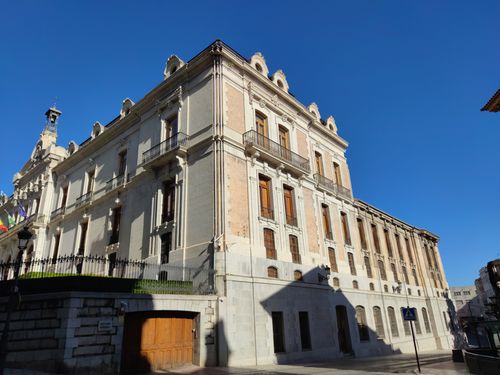 Free Elegant palace facade in Jaén, Spain, showcasing classic architectural style under a clear blue sky. Stock Photo