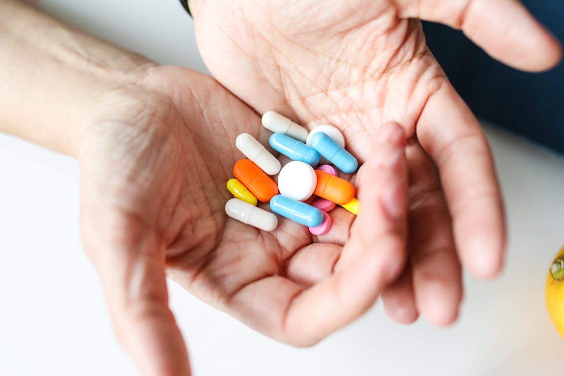 Free Photo Of Medicines On Person's Palm Stock Photo