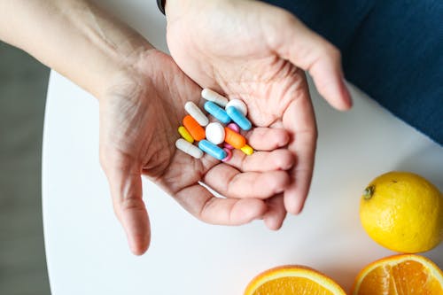 Free Photo Of Medicines On Person's Palm Stock Photo