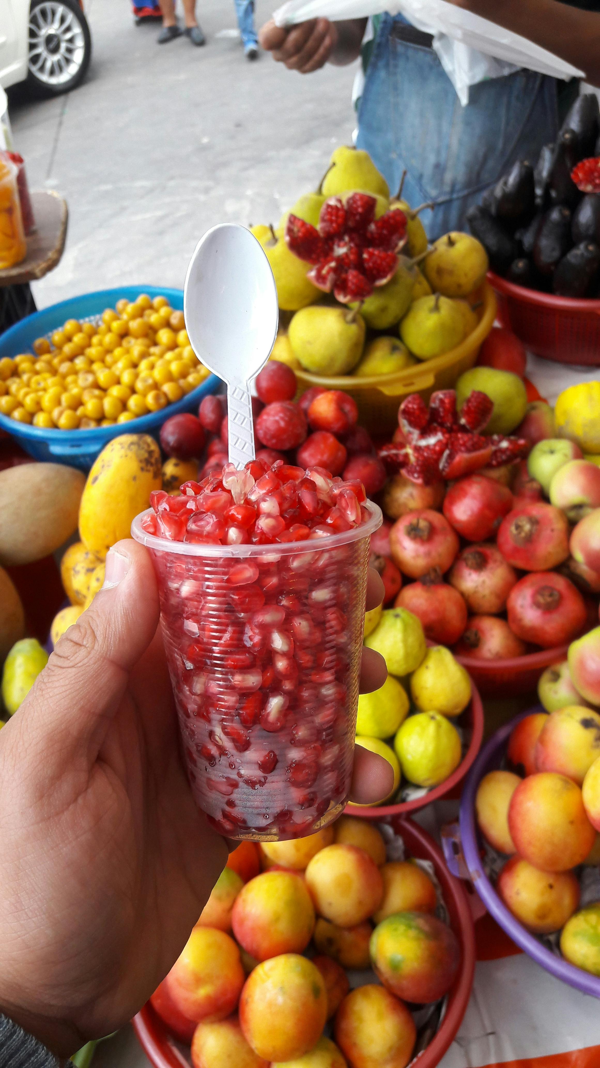 Concerned parent talking to a pediatrician while child sits nearby