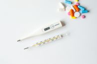Thermometers on White Surface