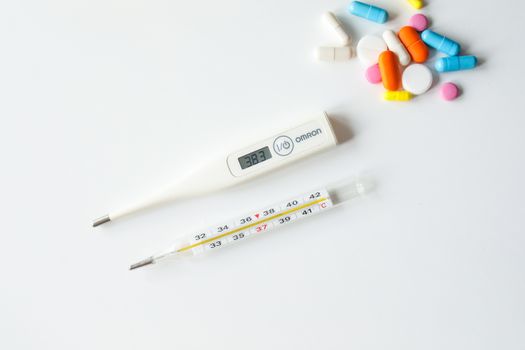 Thermometers on White Surface