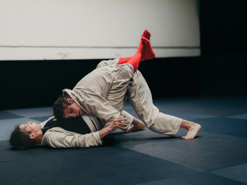 Free Two adults engaged in jiu-jitsu practice indoors at a dojo in Buenos Aires. Stock Photo