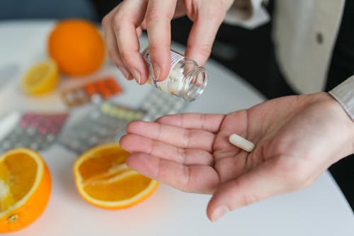 Free Person Taking Pill Stock Photo